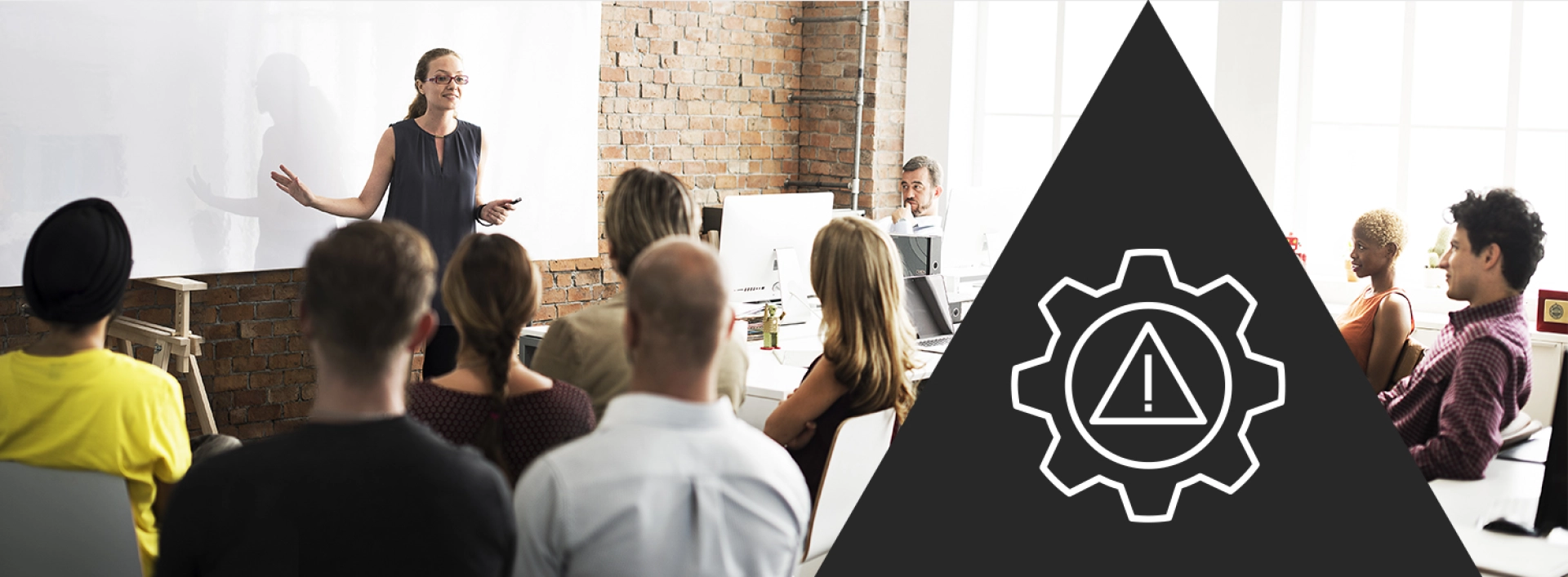 lady delivering crisis communications training to a room of people