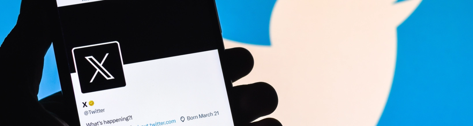 Phone with Twitter / X open